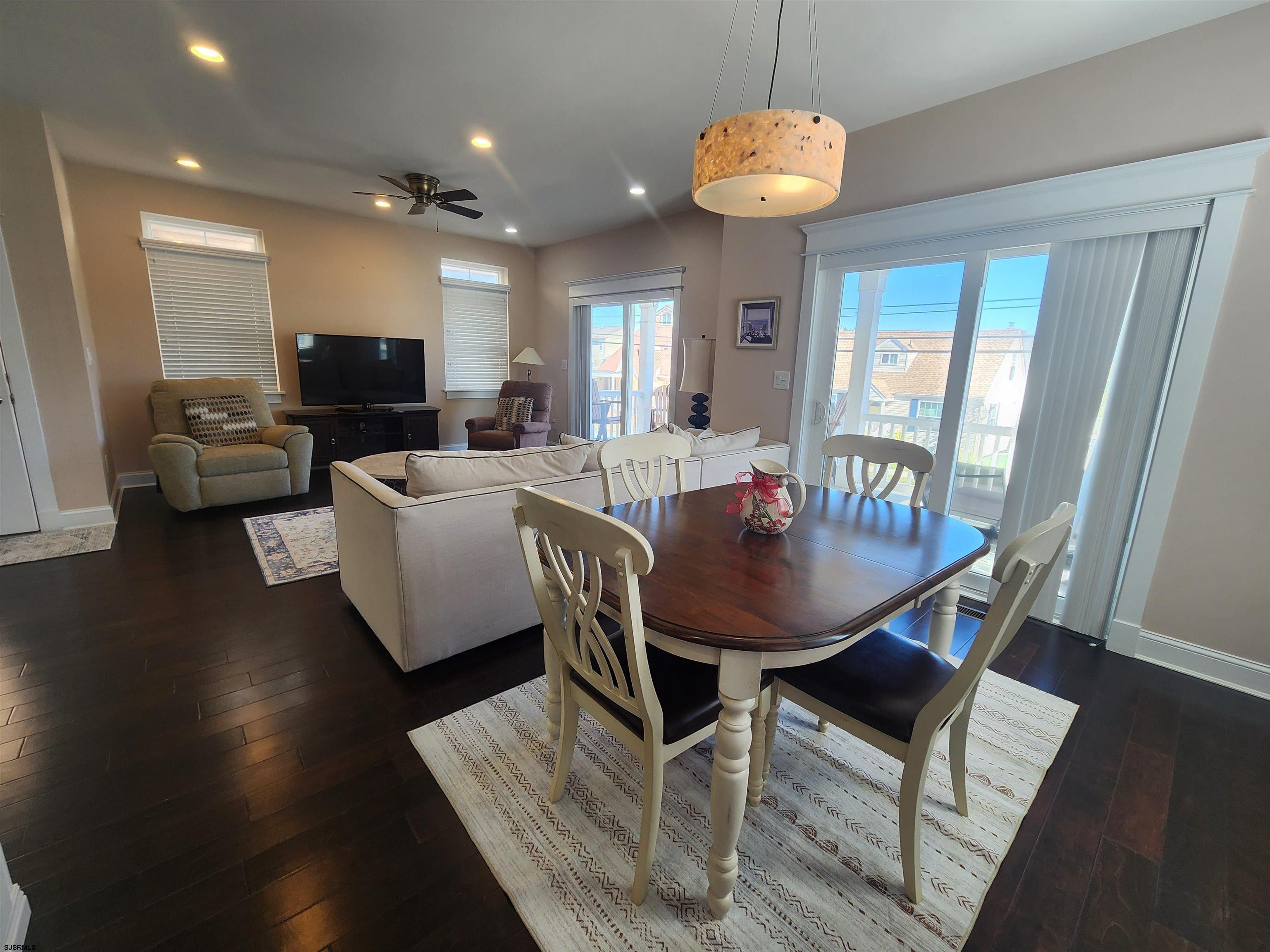 16 North Decatur Avenue, Unit 1 Margate City, NJ 08402 - Photo 4 of 29 a view of a dining room with furniture and wooden floor