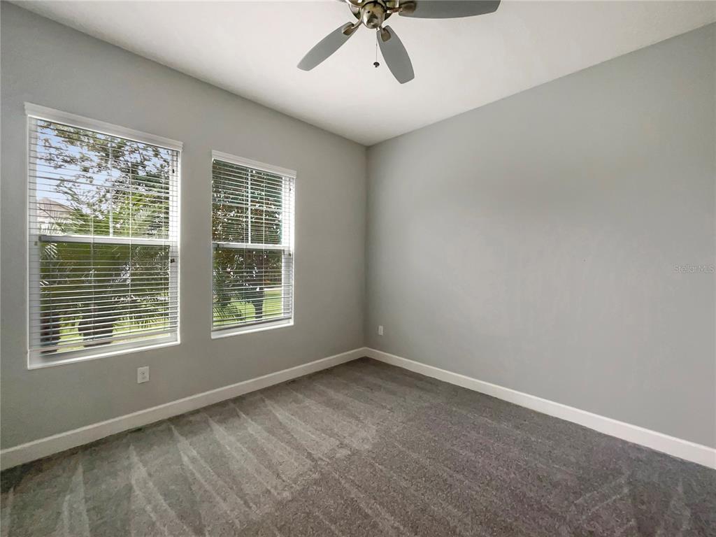 705 Winterside Drive Apollo Beach, FL 33572 - Photo 11 of 30 a view of an empty room with a window