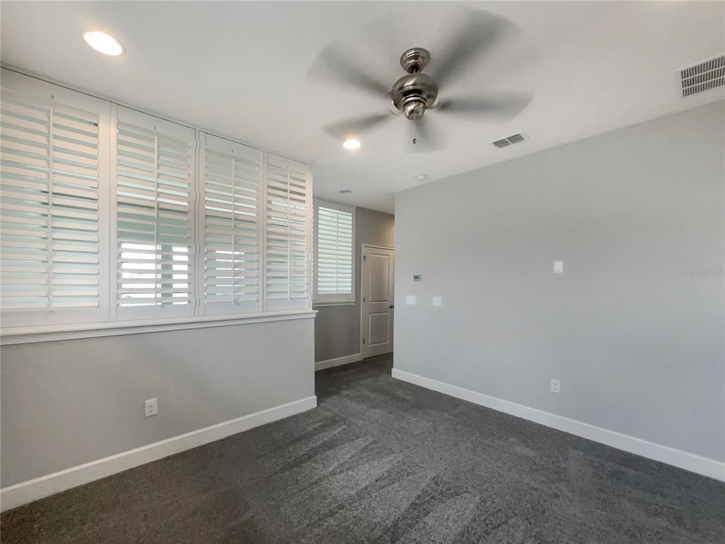 705 Winterside Drive Apollo Beach, FL 33572 - Photo 14 of 30 a view of an empty room with a window