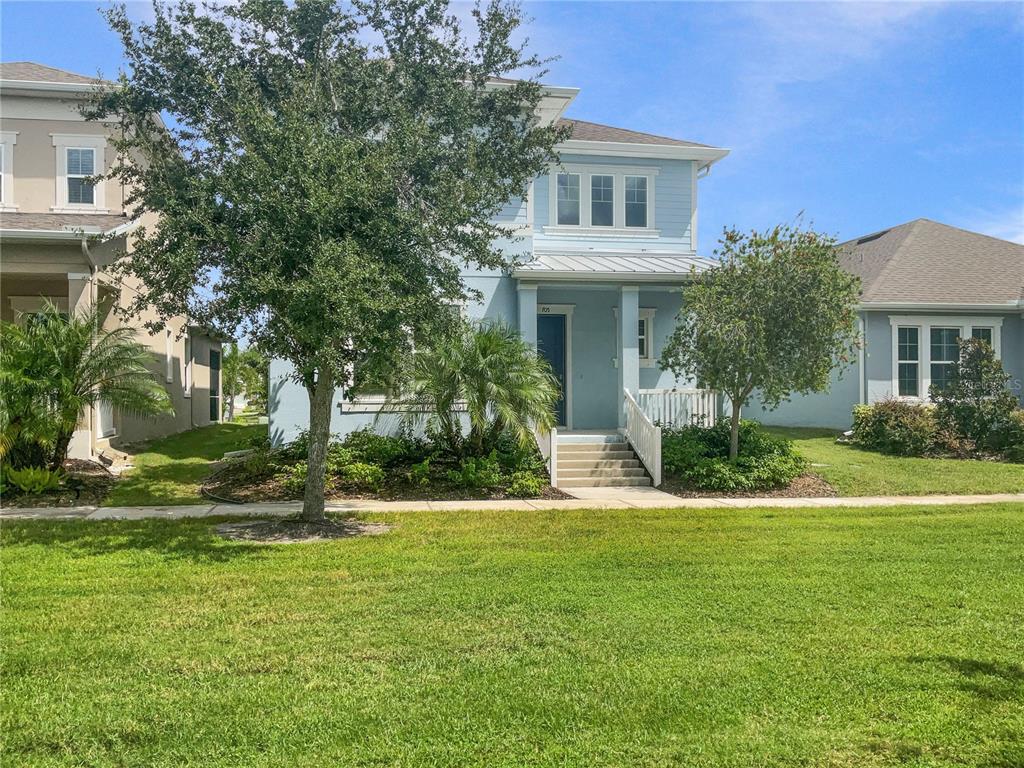 705 Winterside Drive Apollo Beach, FL 33572 - Photo 3 of 30 a front view of a house with a yard