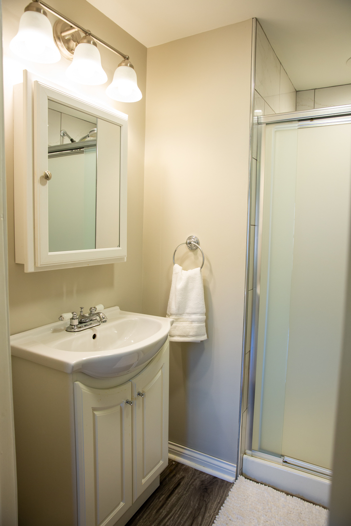 2453 South 3rd Avenue North Riverside, IL 60546 - Photo 13 of 17 a bathroom with a sink and mirror