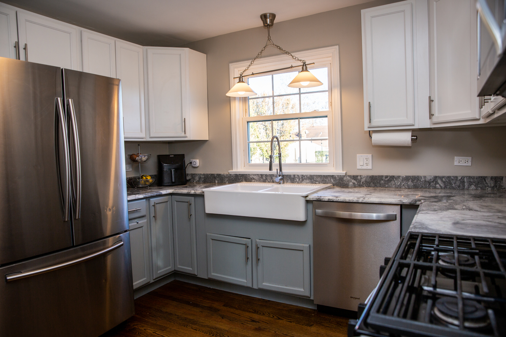 2453 South 3rd Avenue North Riverside, IL 60546 - Photo 6 of 17 a kitchen with a sink stove and refrigerator