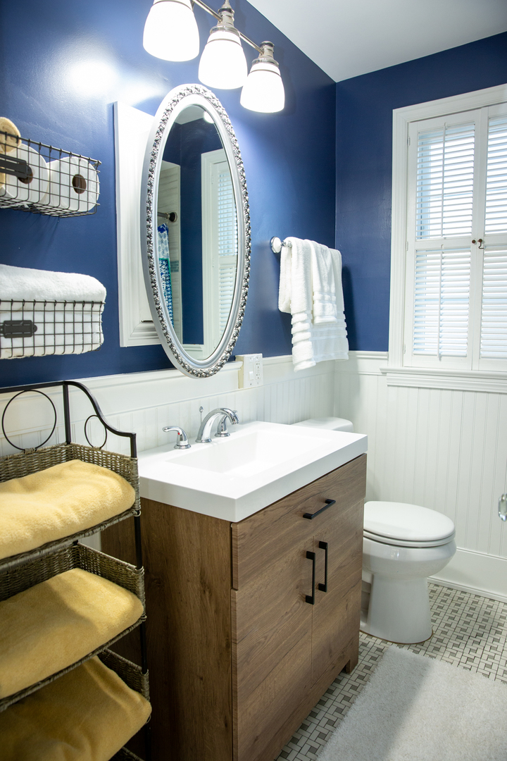 2453 South 3rd Avenue North Riverside, IL 60546 - Photo 8 of 17 a bathroom with a toilet a sink and a mirror