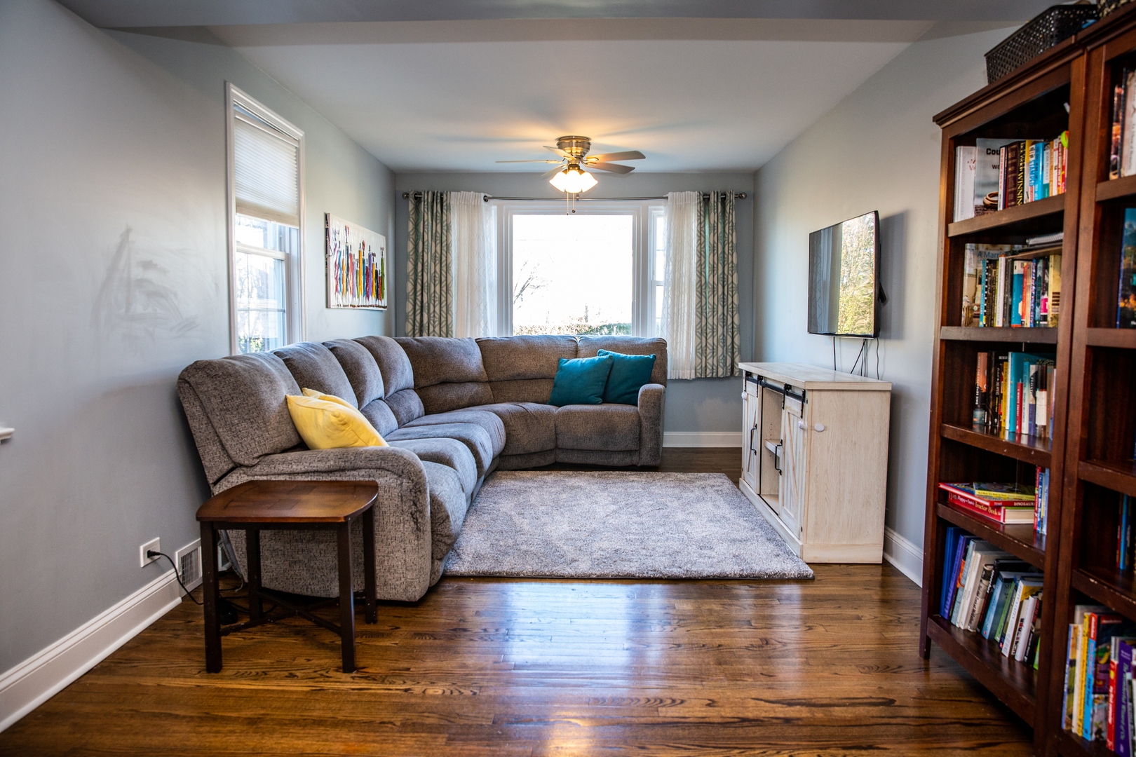 2453 South 3rd Avenue North Riverside, IL 60546 - Photo 9 of 17 a living room with furniture and a book shelf