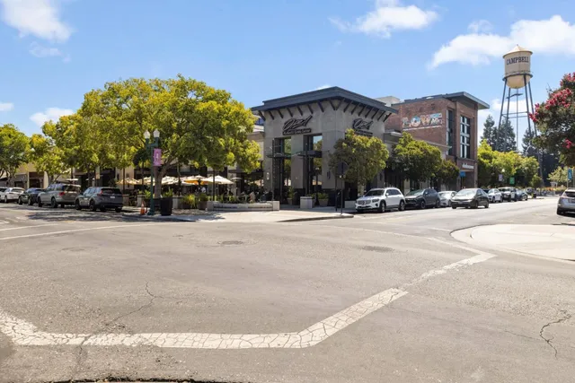 a view of street with a building in the background