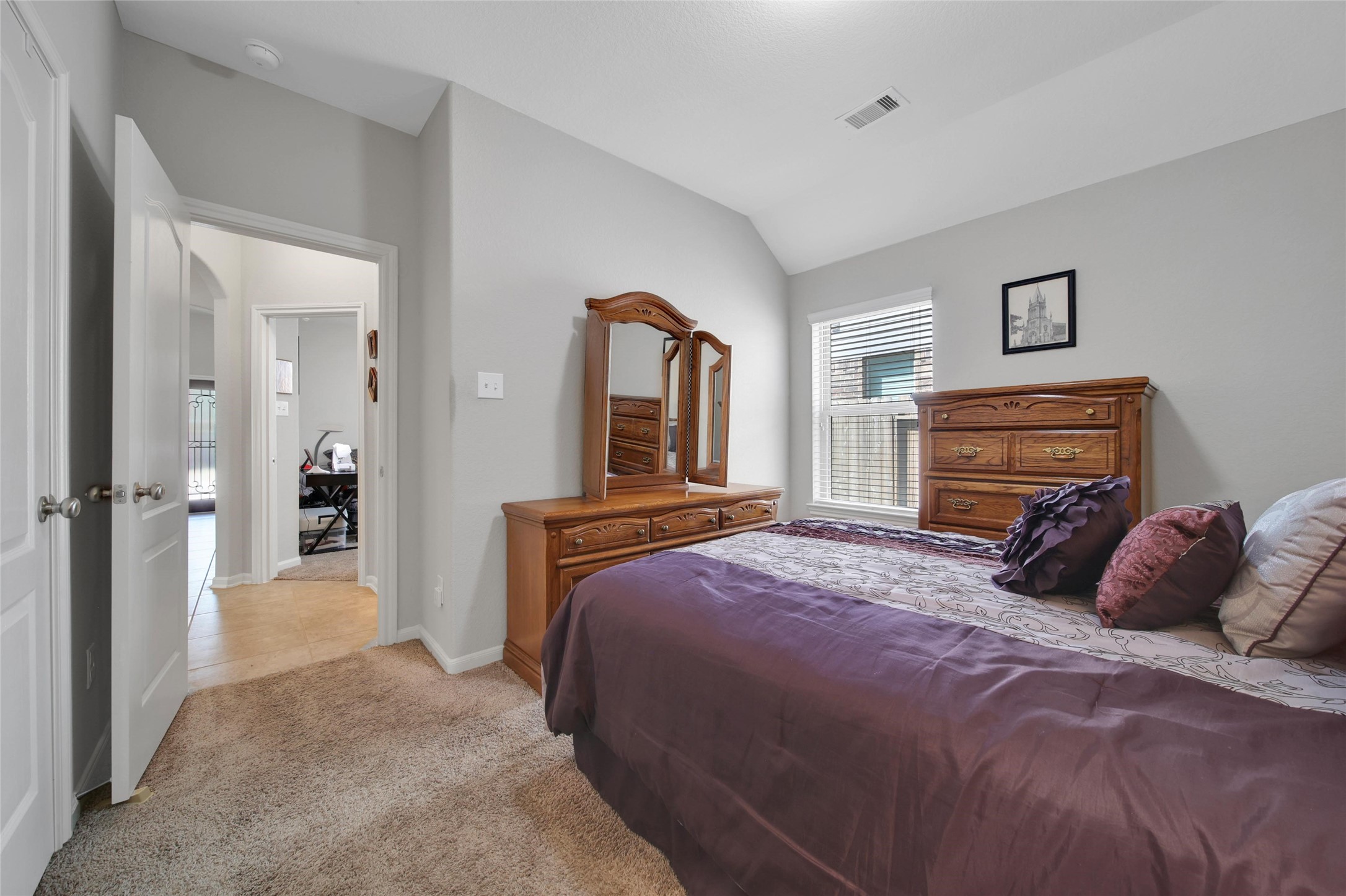 214 Pleasant Hill Way Conroe, TX 77304 - Photo 26 of 43 This bedroom sits in the middle of the home.