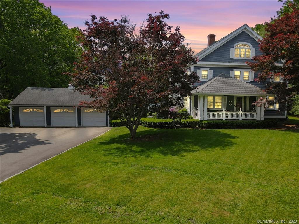 65 Bishop Street North Haven, CT 06473 - Photo 1 of 1 a front view of a house with a yard and trees