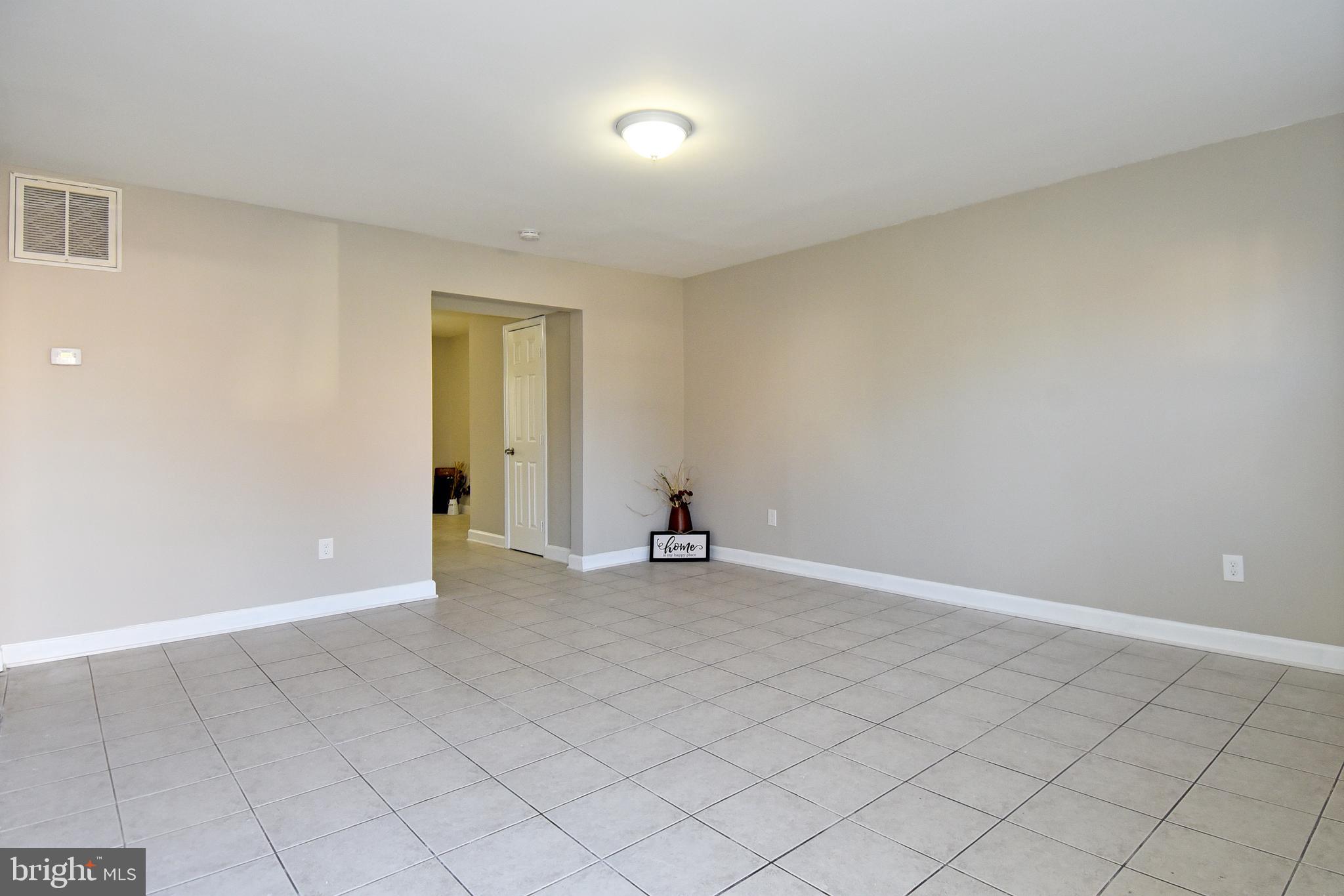 9778 Bragg Lane Manassas, VA 20110 - Photo 5 of 30 Tile Floor on entire main level