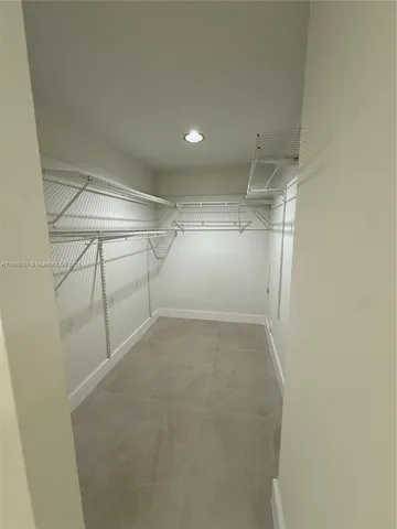 a view of a room with racks on the wall