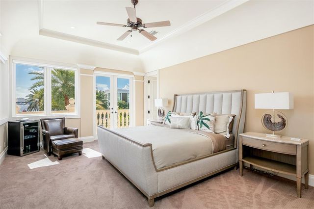 a view of a lobby with swimming pool and sitting area