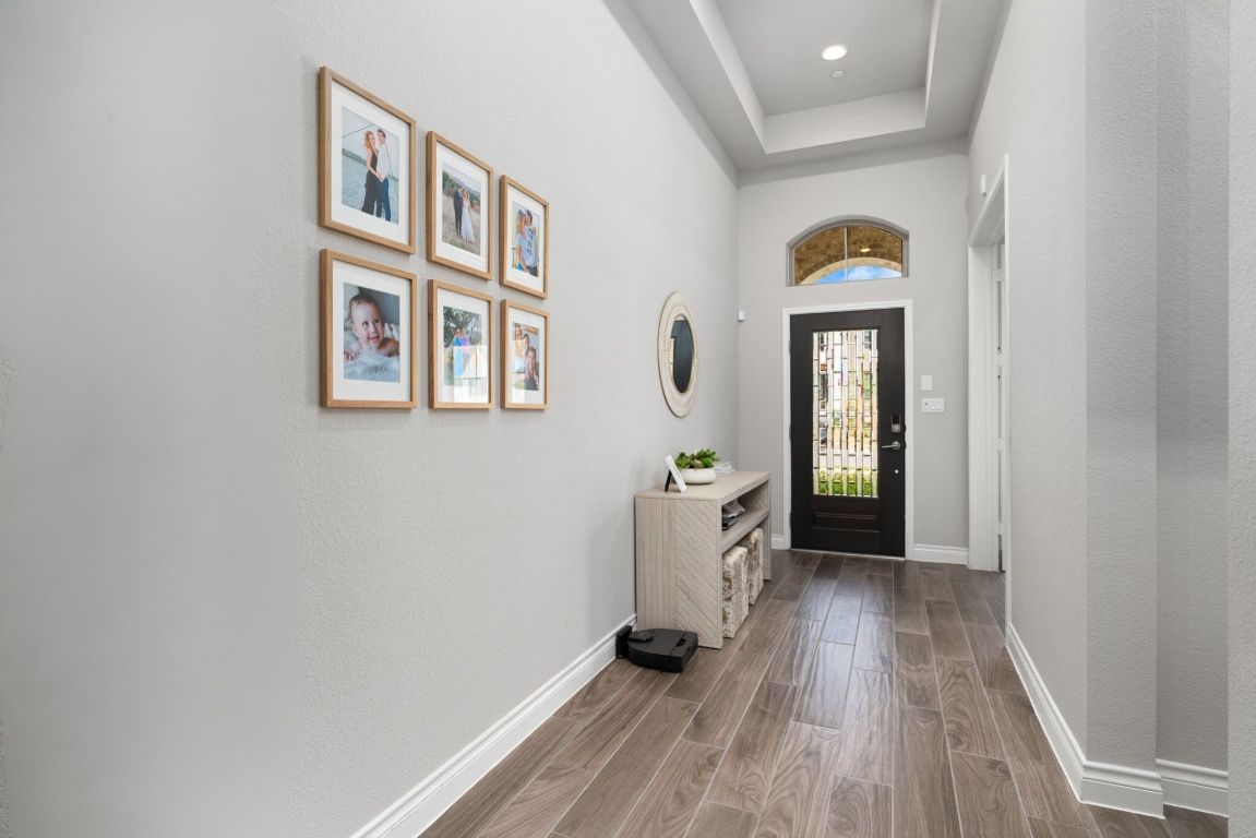6105 Fadden Road Austin, TX 78738 - Photo 3 of 40 a view of livingroom with furniture and wooden floor