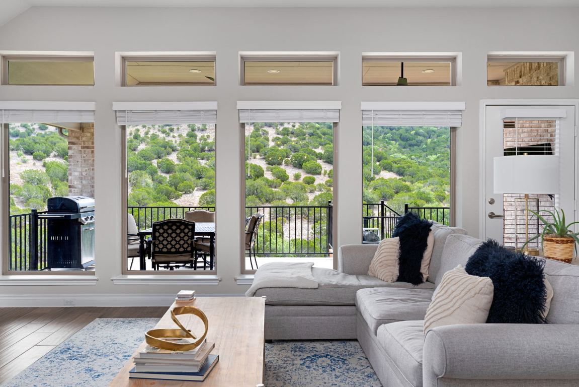 6105 Fadden Road Austin, TX 78738 - Photo 9 of 40 a living room with furniture and a large window