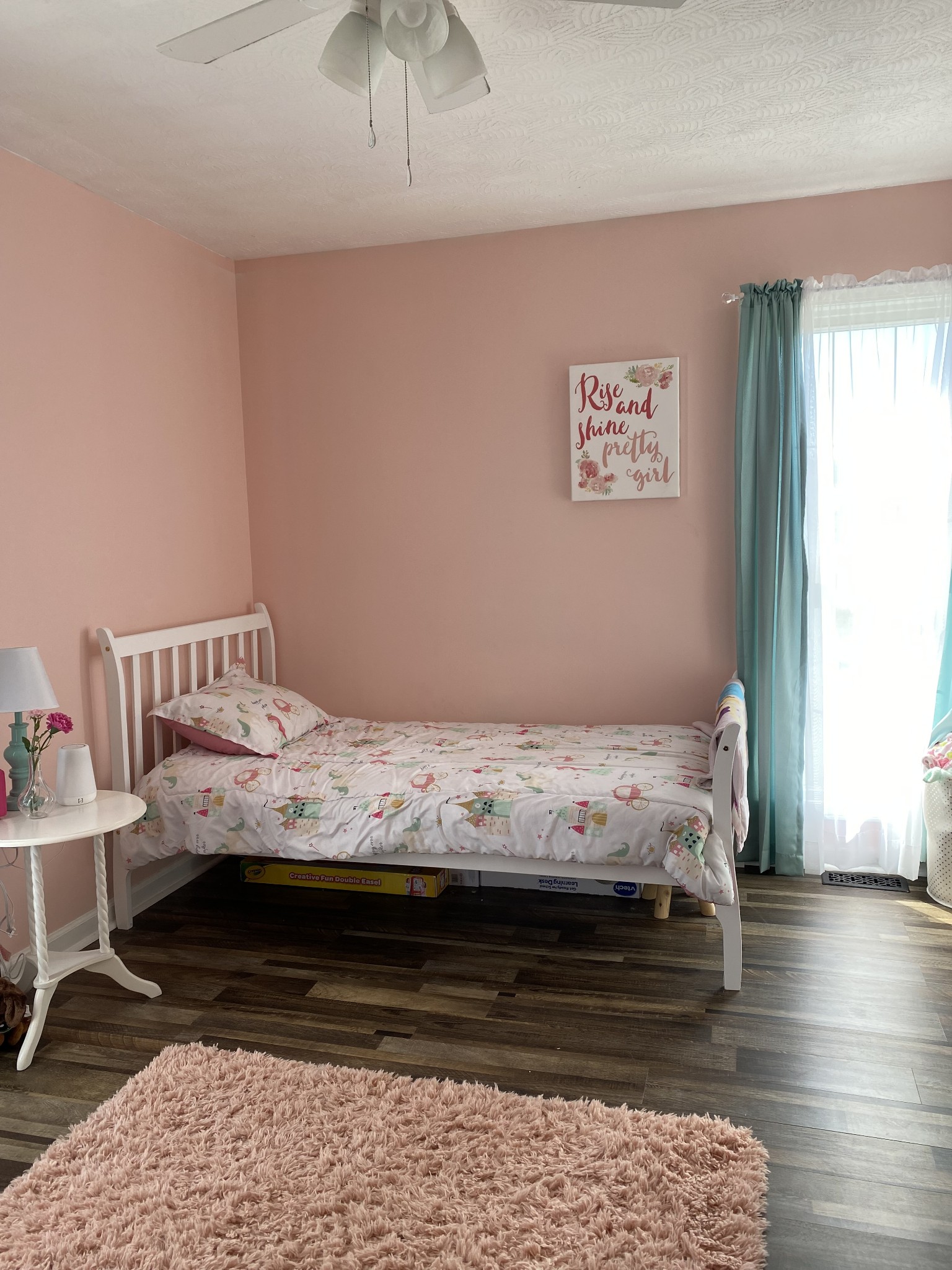387 Garrett Road Lafayette, TN 37083 - Photo 8 of 17 a bedroom with a bed and wooden floor