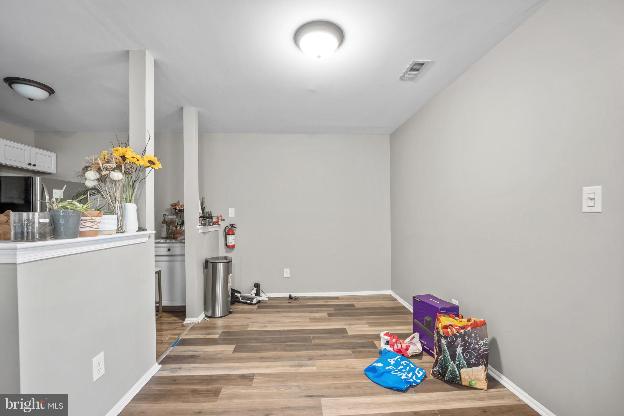 603 Quail Road Marlton, NJ 08053 - Photo 13 of 15 a bedroom with a bed and a chandelier