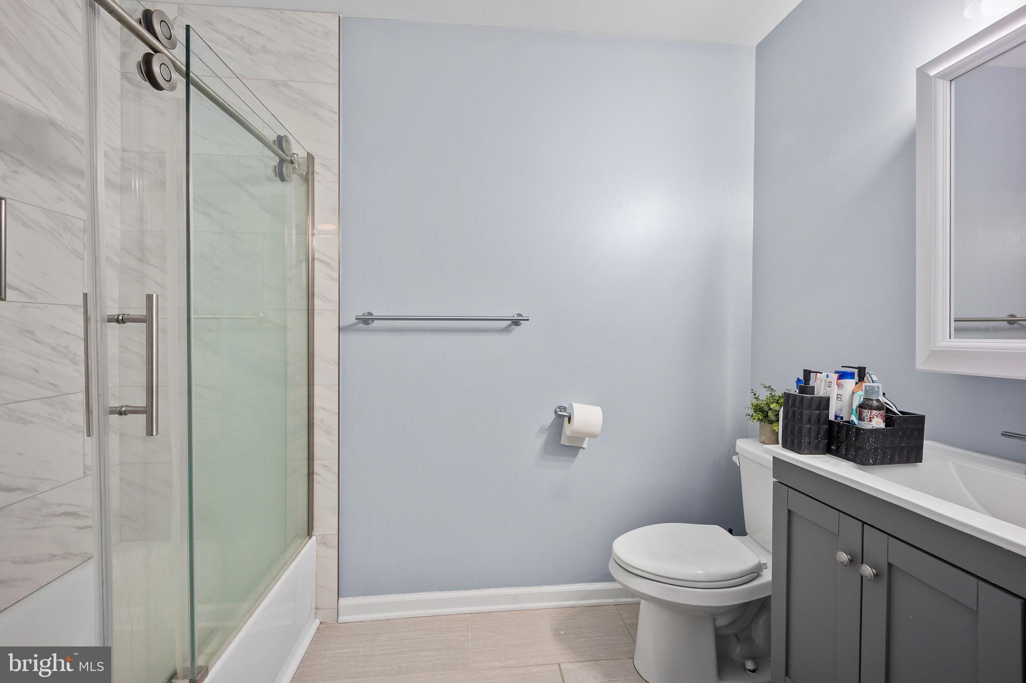 603 Quail Road Marlton, NJ 08053 - Photo 6 of 15 a bathroom with a sink toilet and shower