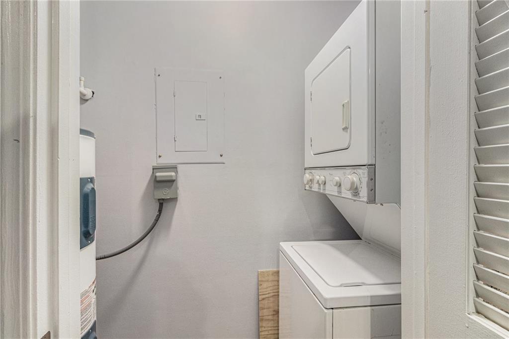 2657 Lenox Road Northeast, Unit C38 Atlanta, GA 30324 - Photo 14 of 20 a utility room with dryer and washer