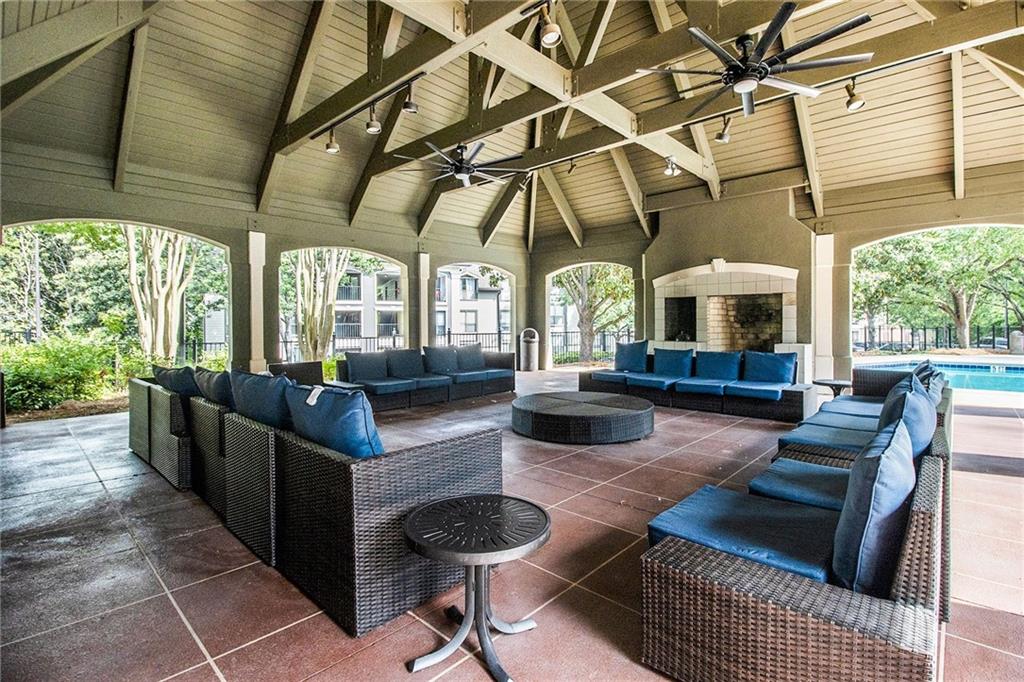 2657 Lenox Road Northeast, Unit C38 Atlanta, GA 30324 - Photo 19 of 20 a living room with furniture and a large window