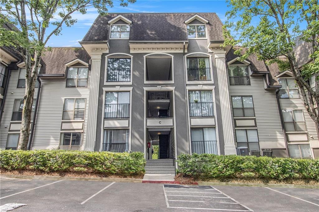 2657 Lenox Road Northeast, Unit C38 Atlanta, GA 30324 - Photo 3 of 20 front view of a brick building