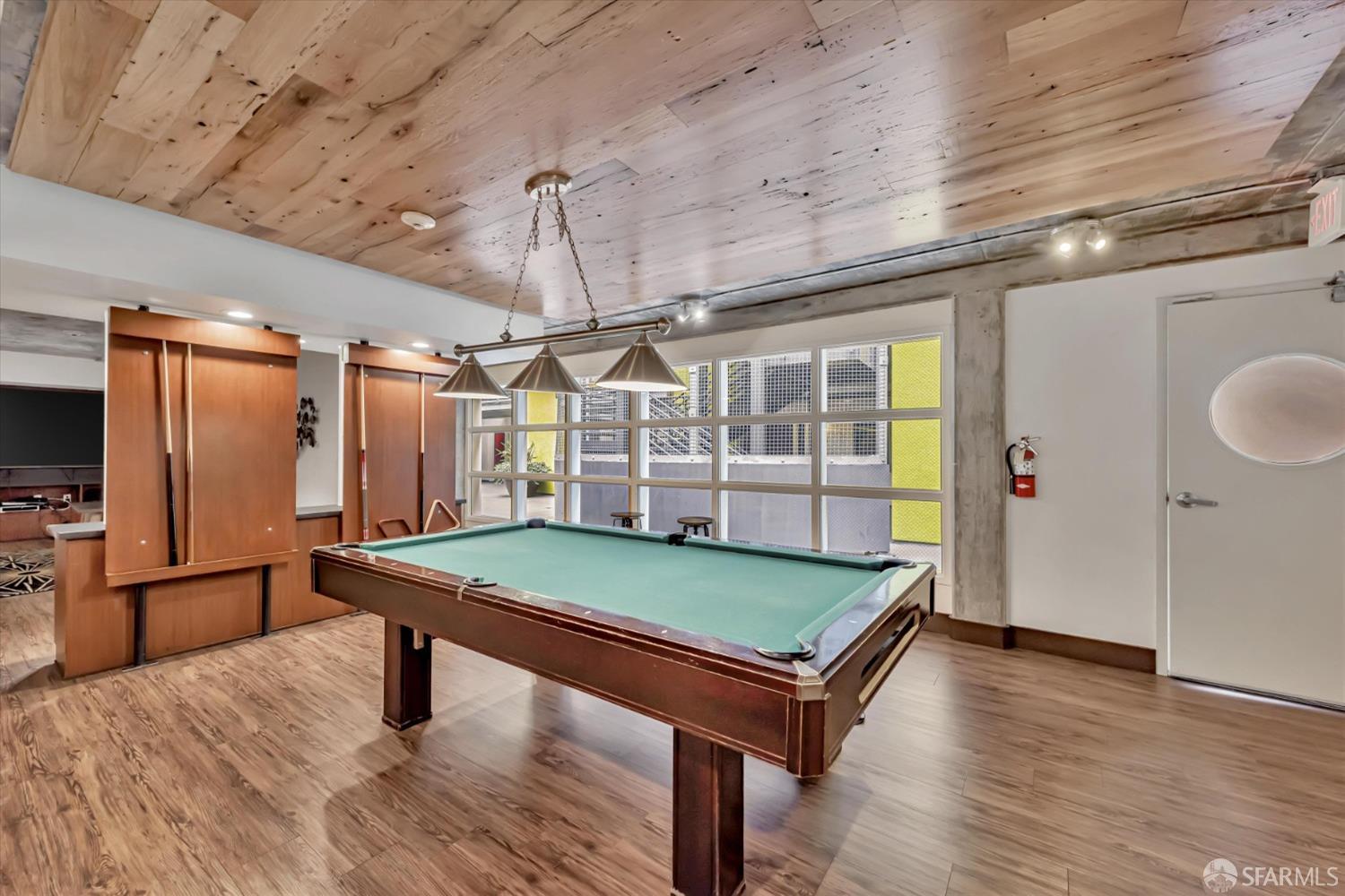 311 Oak Street, Unit 539 Oakland, CA 94607 - Photo 50 of 55 a room with pool table and windows