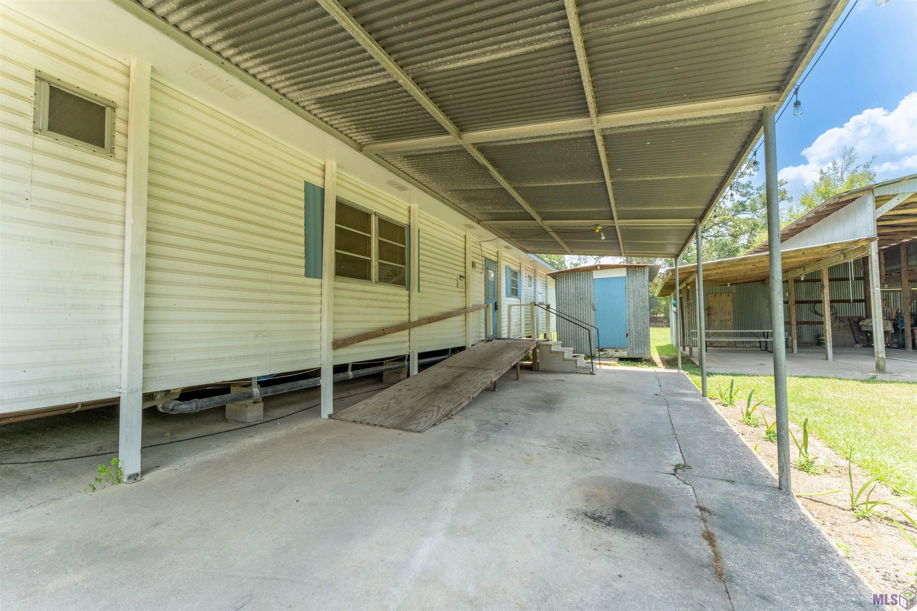 8784 Old Winchester Road Denham Springs, LA 70706 - Photo 12 of 15 13 x 33 Carport