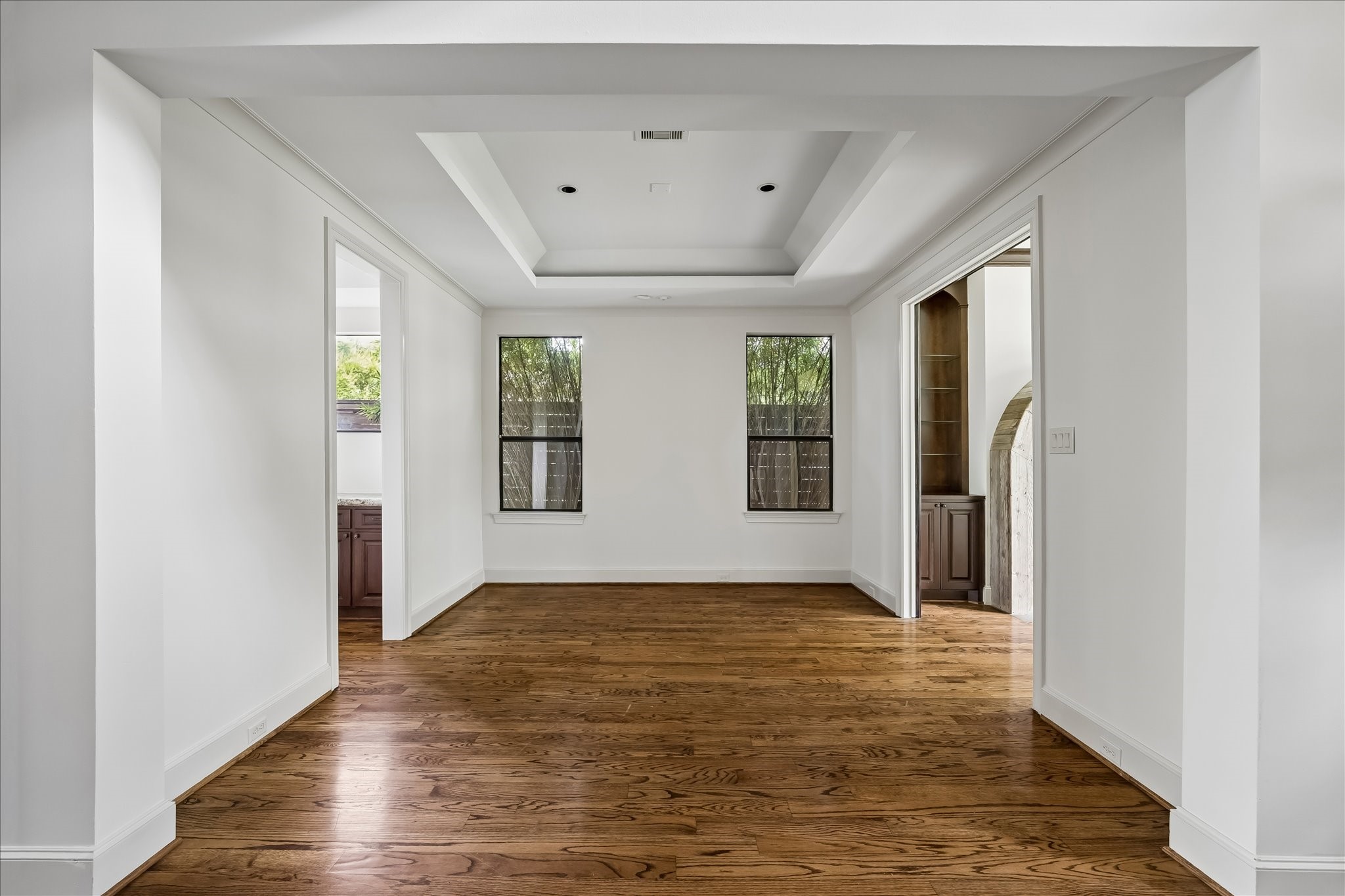 2246 Branard Street Houston, TX 77098 - Photo 8 of 40 Centrally located dining space with elevated ceilings, wood floors, and endless design potential.