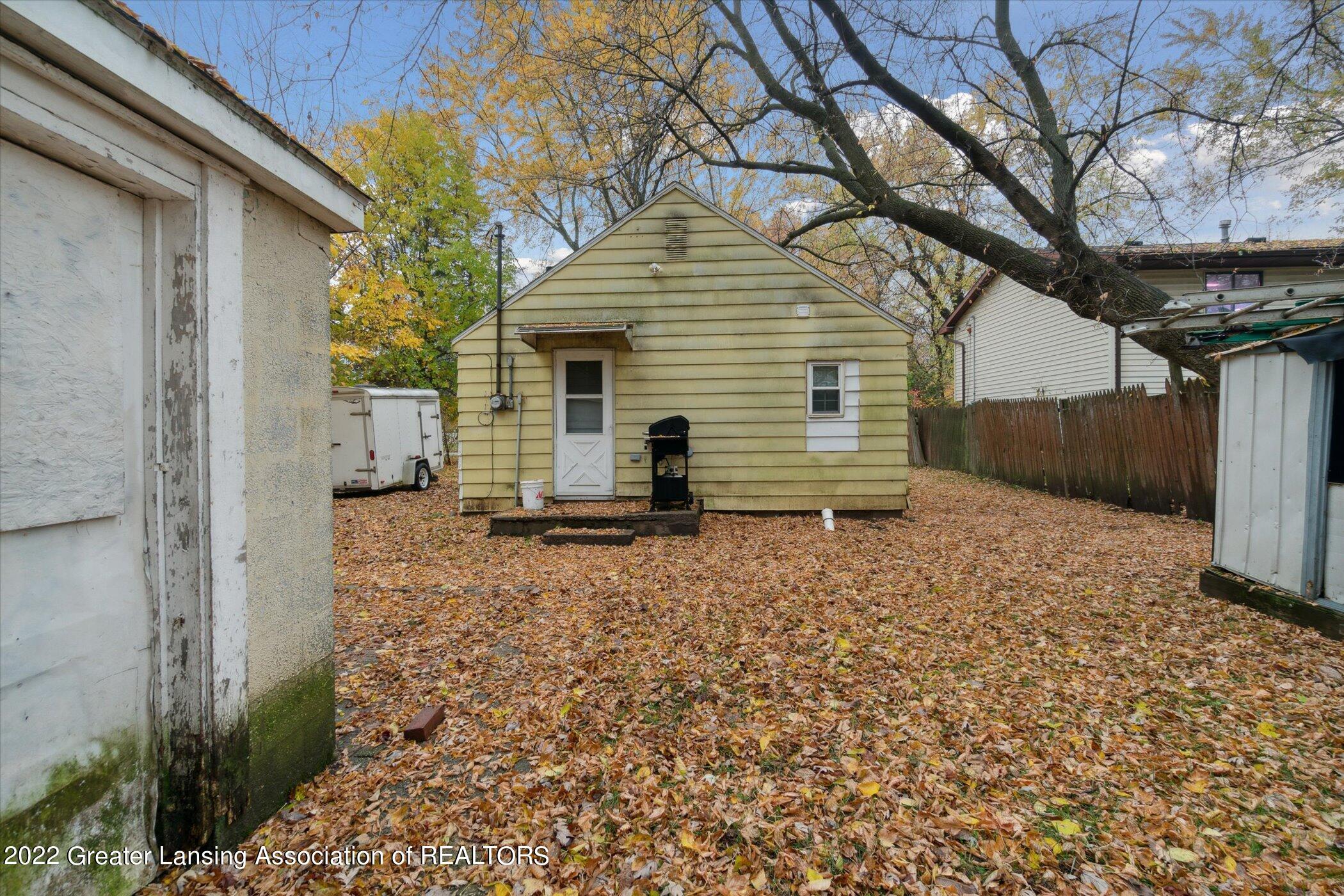 5439 Hughes Road Lansing, MI 48911 - Photo 8 of 10 10-5439-Hughes-Rd-WindowStill-Real-Estat