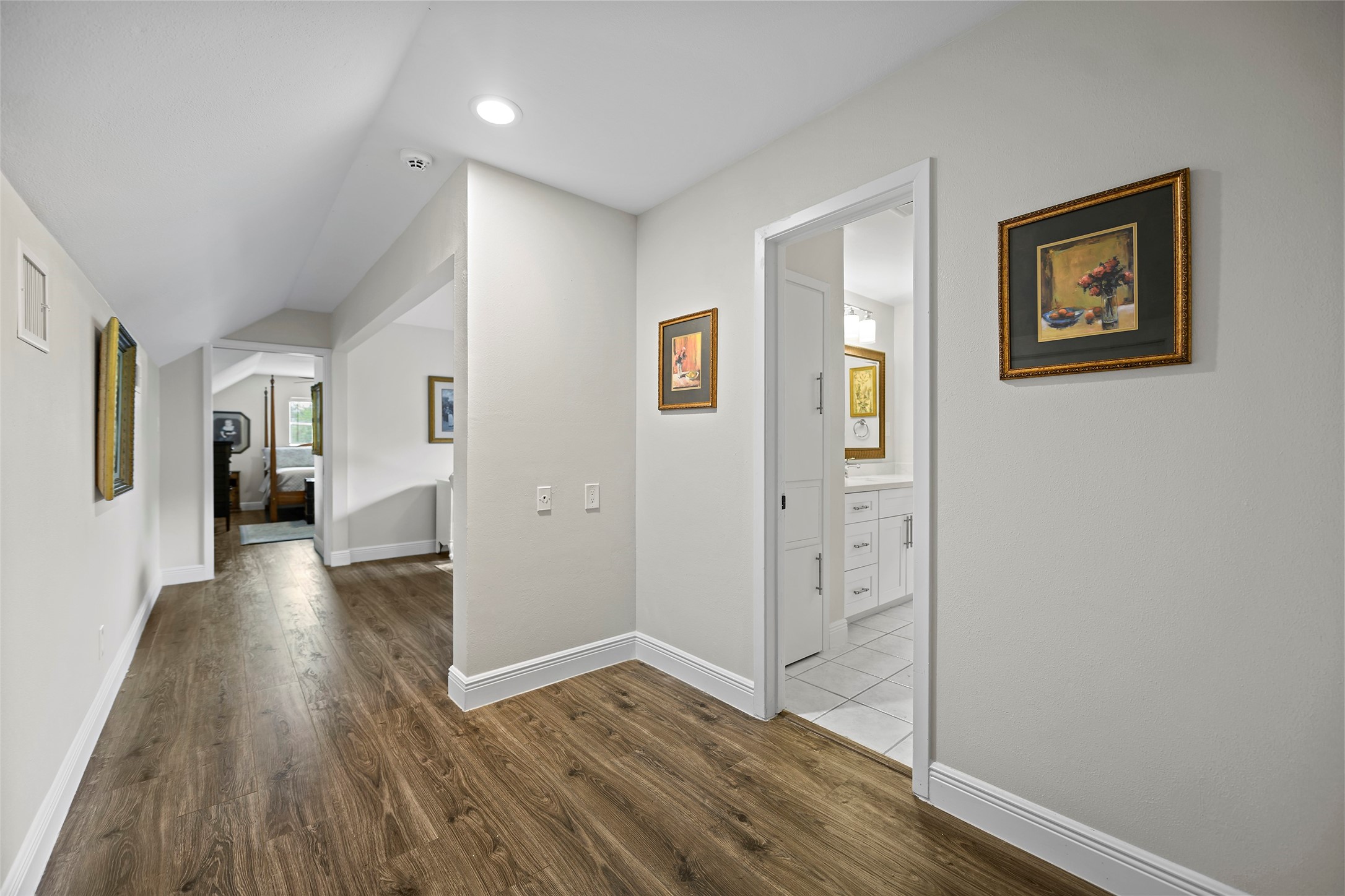 4419 Langtry Lane Houston, TX 77041 - Photo 13 of 50 a view of a hallway with wooden floor and closet