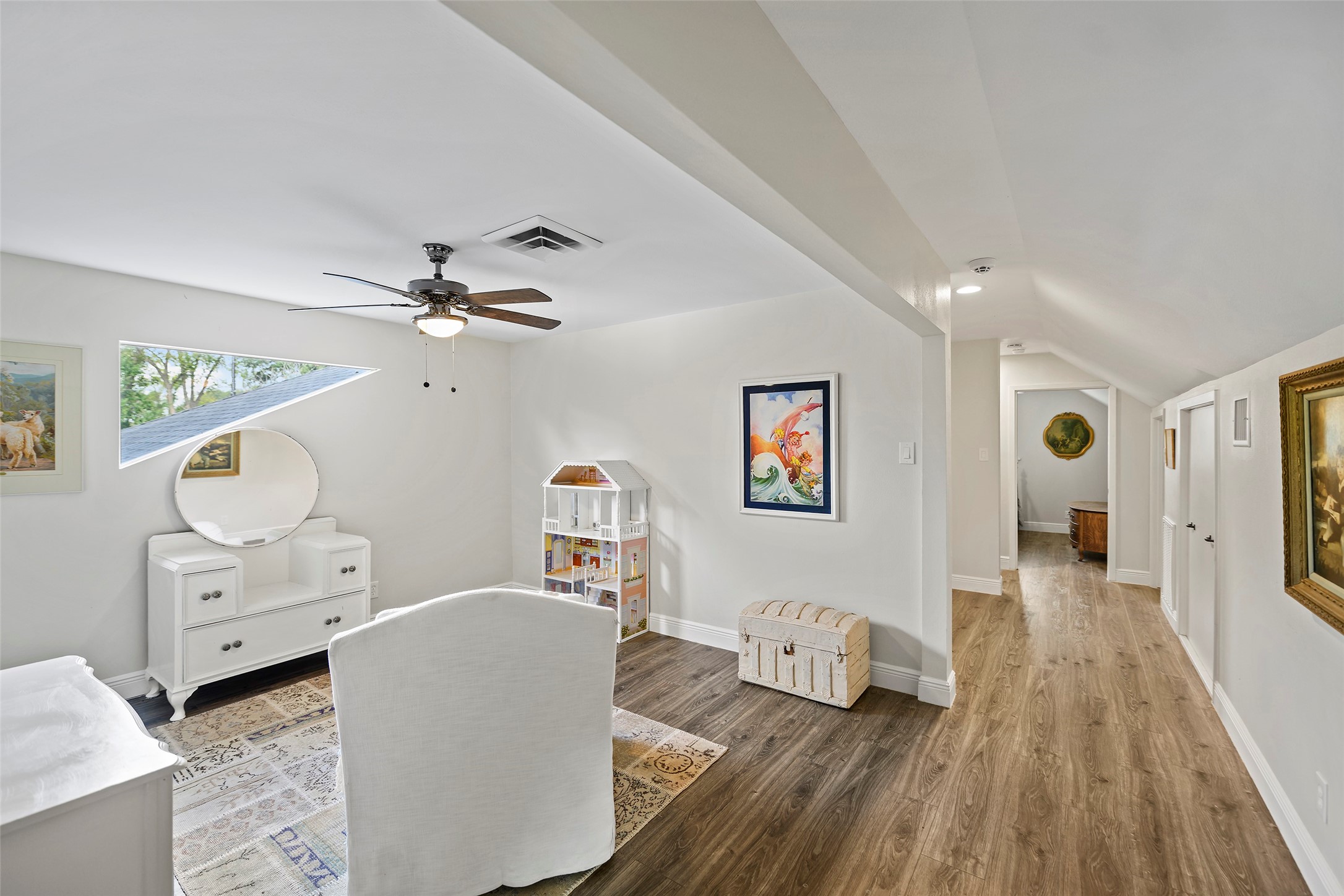 4419 Langtry Lane Houston, TX 77041 - Photo 20 of 50 a living room with furniture and wooden floor