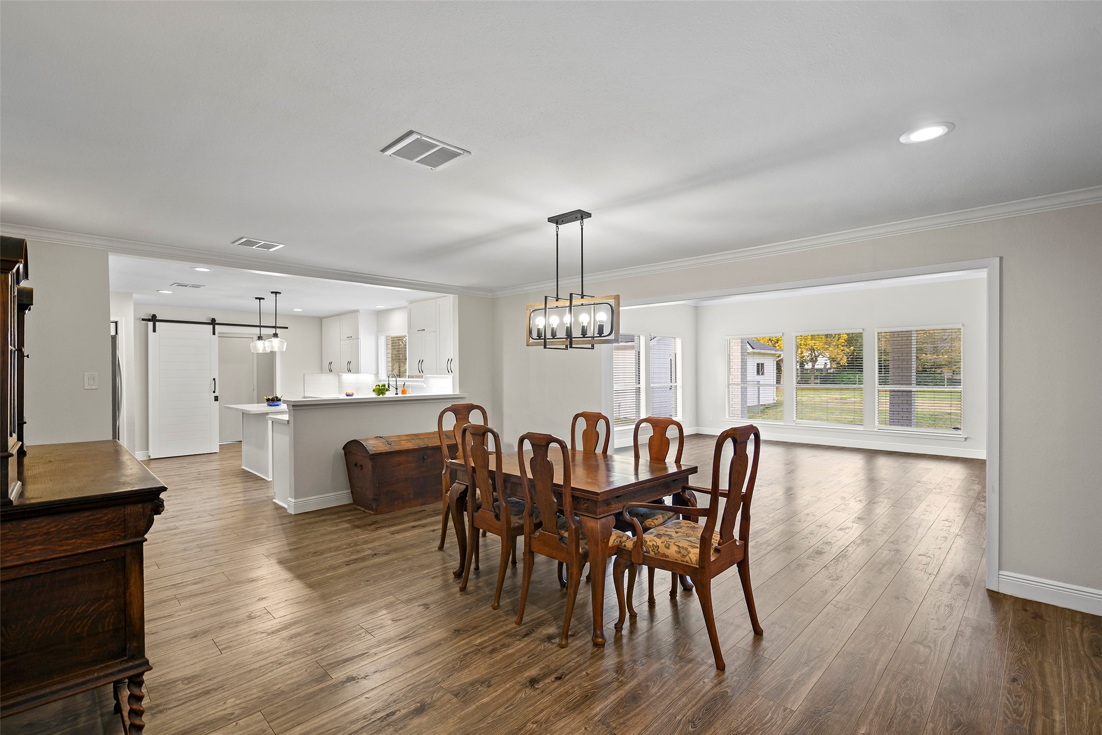 4419 Langtry Lane Houston, TX 77041 - Photo 21 of 50 a view of a dining room with furniture window and wooden floor