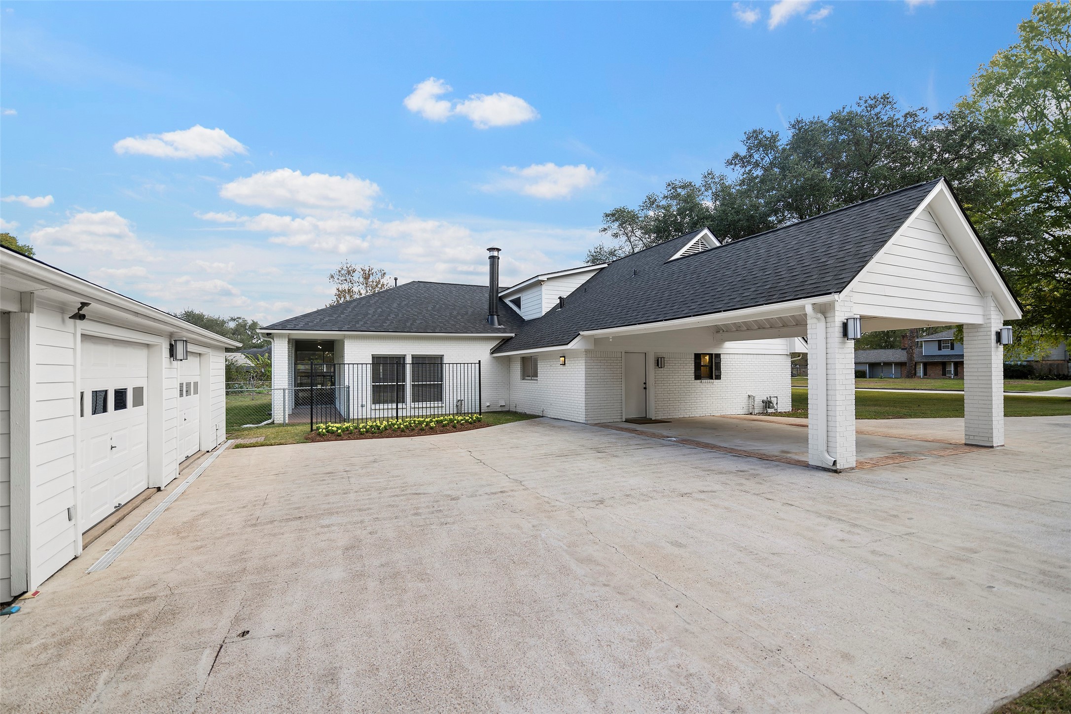 4419 Langtry Lane Houston, TX 77041 - Photo 34 of 50 a view of a house with a yard and potted plants