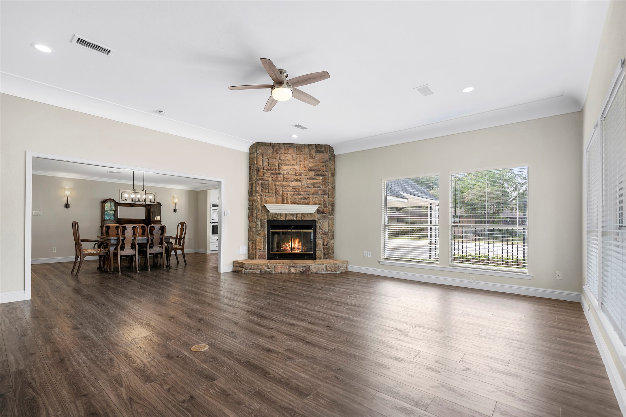 4419 Langtry Lane Houston, TX 77041 - Photo 36 of 50 a view of a livingroom with furniture a fireplace wooden floor and a window