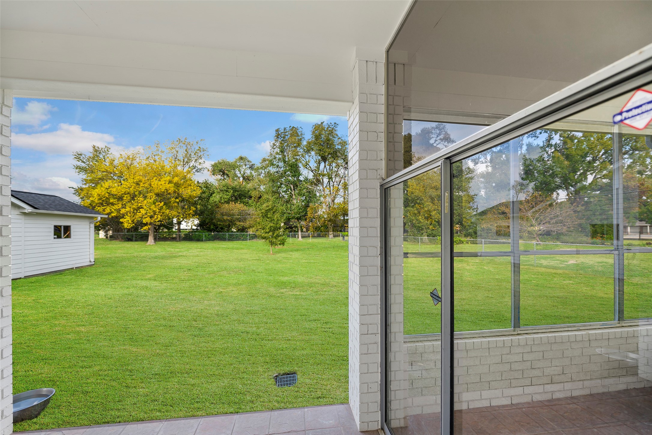 4419 Langtry Lane Houston, TX 77041 - Photo 39 of 50 Patio looking at sun room and backyard