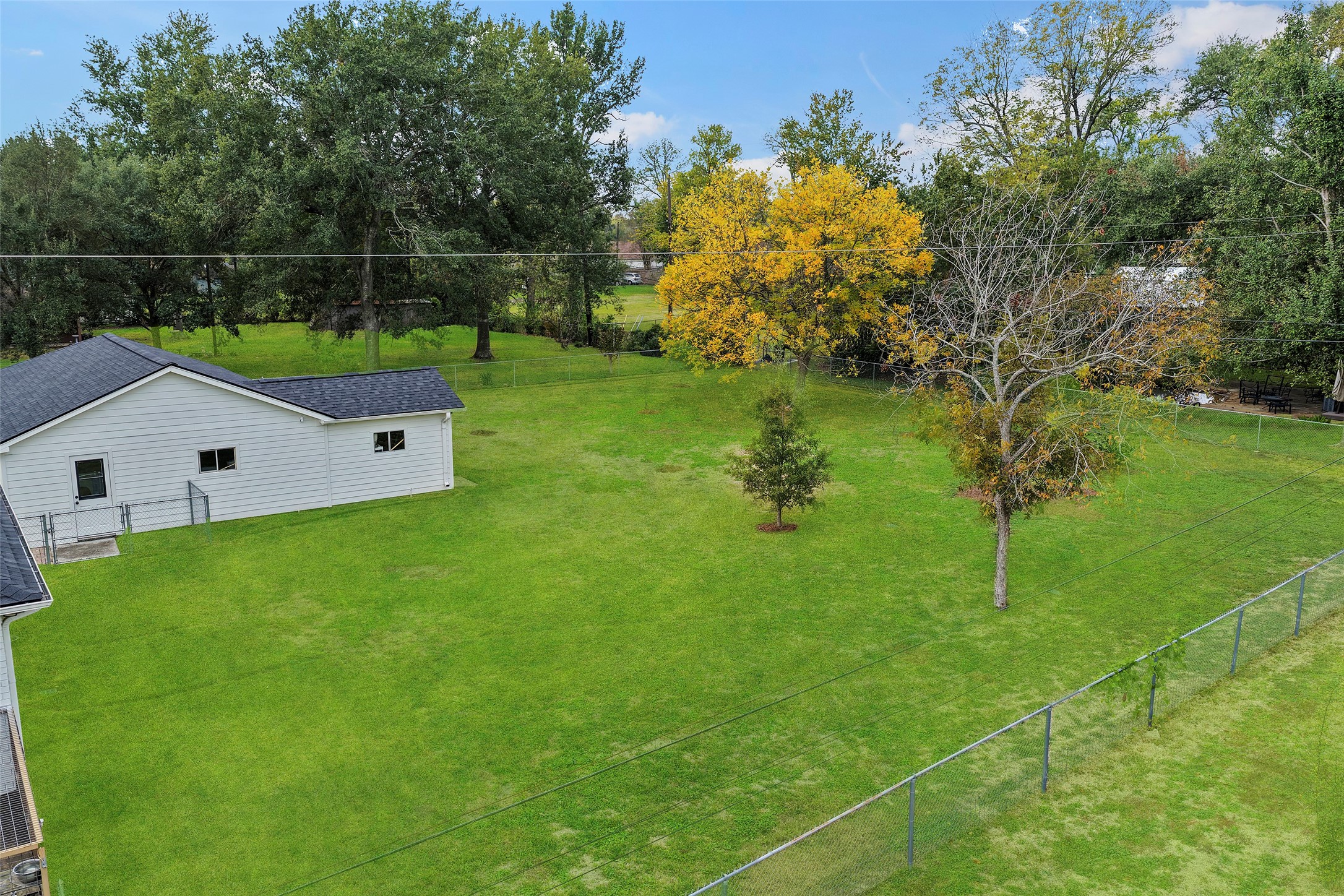 4419 Langtry Lane Houston, TX 77041 - Photo 43 of 50 a view of a house with a backyard
