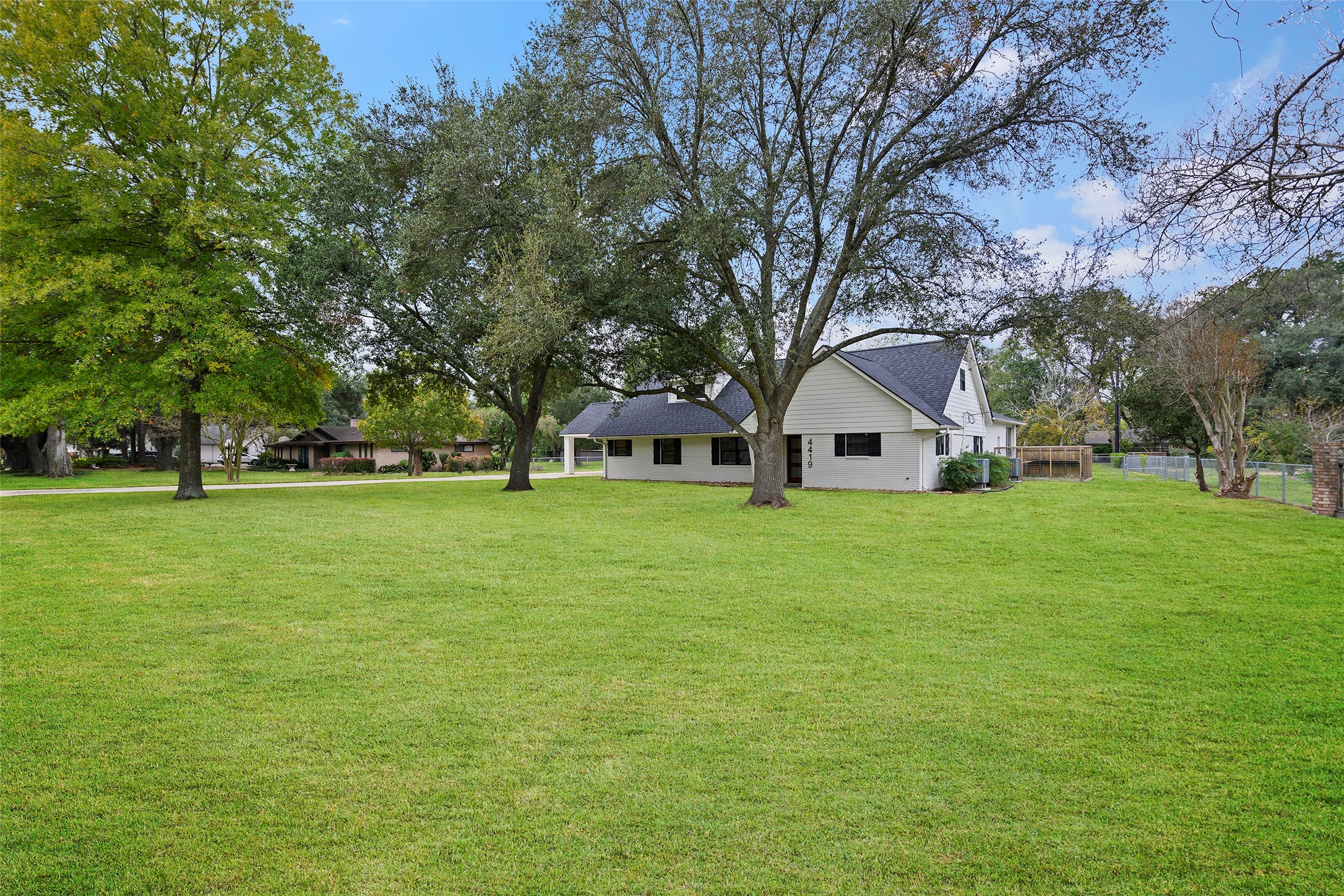 4419 Langtry Lane Houston, TX 77041 - Photo 50 of 50 a view of a house with a big yard