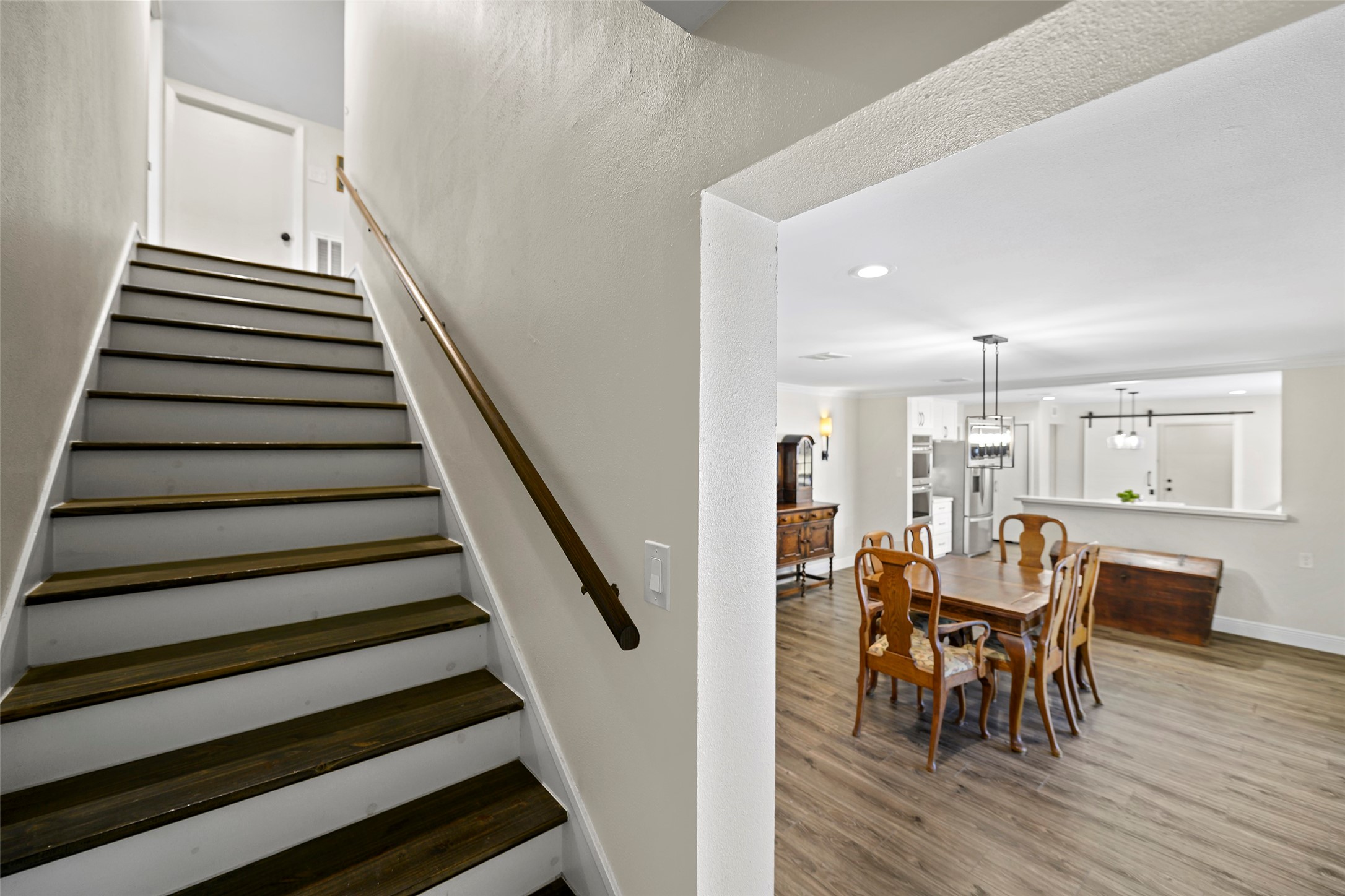 4419 Langtry Lane Houston, TX 77041 - Photo 10 of 50 a view of a dining room with furniture and wooden floor