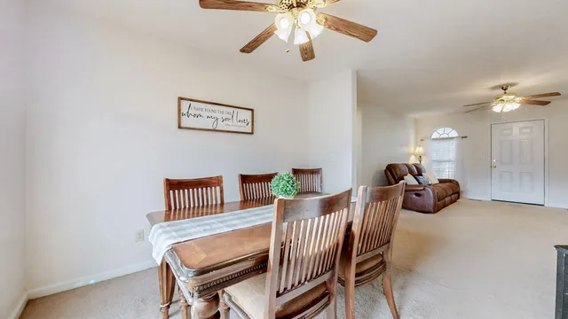 a view of a livingroom with furniture