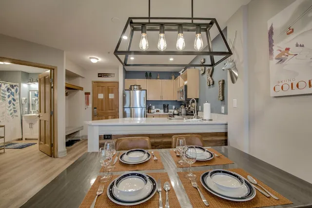 a bathroom with a toilet a sink and a mirror