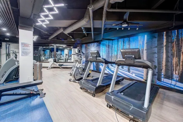 a view of a room with gym equipment