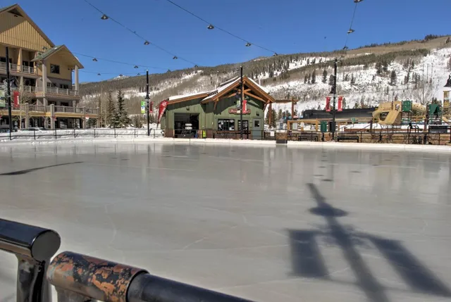 a view of swimming pool with outdoor seating
