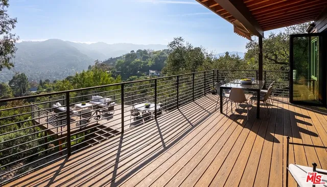 a view of balcony deck and patio