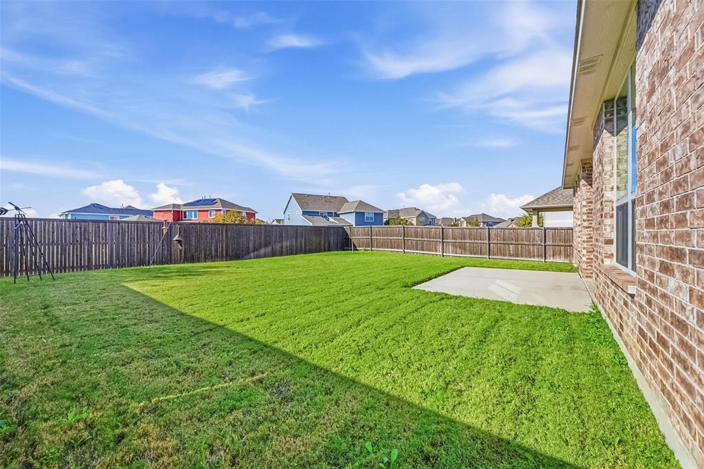 2013 Historic District Aubrey, TX 76227 - Photo 18 of 25 a view of yard with swimming pool and deck in the back