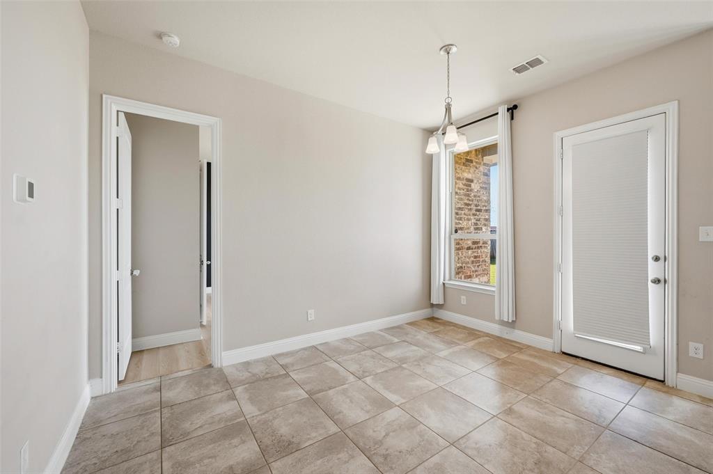2013 Historic District Aubrey, TX 76227 - Photo 10 of 25 a view of an empty room with a window