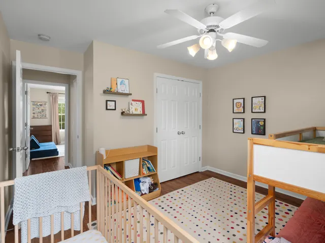 a bedroom with furniture and windows