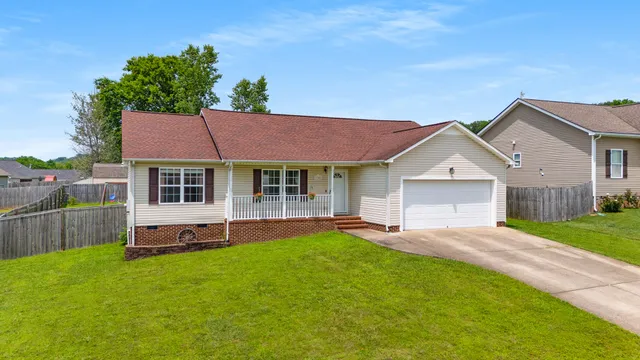 a view of yard with outdoor seating and green space