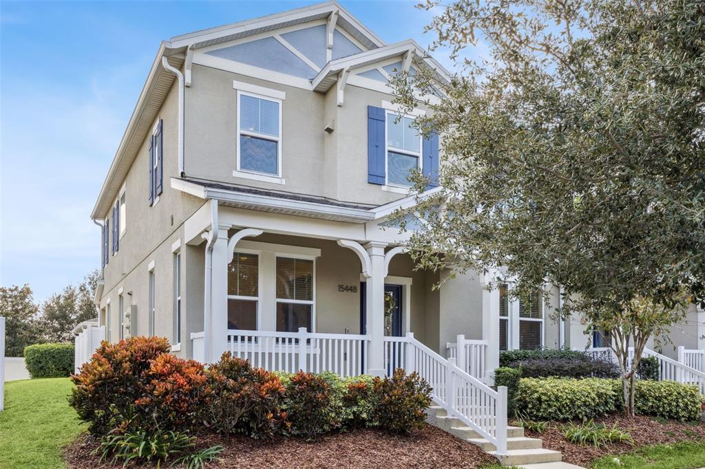 15448 Blackbead Street Winter Garden, FL 34787 - Photo 1 of 28 a front view of a house with a garden