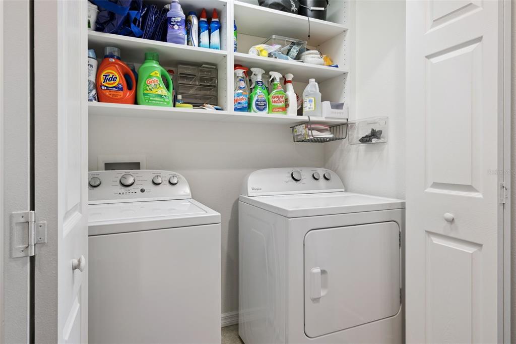 15448 Blackbead Street Winter Garden, FL 34787 - Photo 18 of 28 a utility room with dryer and washer