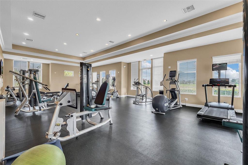 15448 Blackbead Street Winter Garden, FL 34787 - Photo 24 of 28 a view of a room with gym equipment