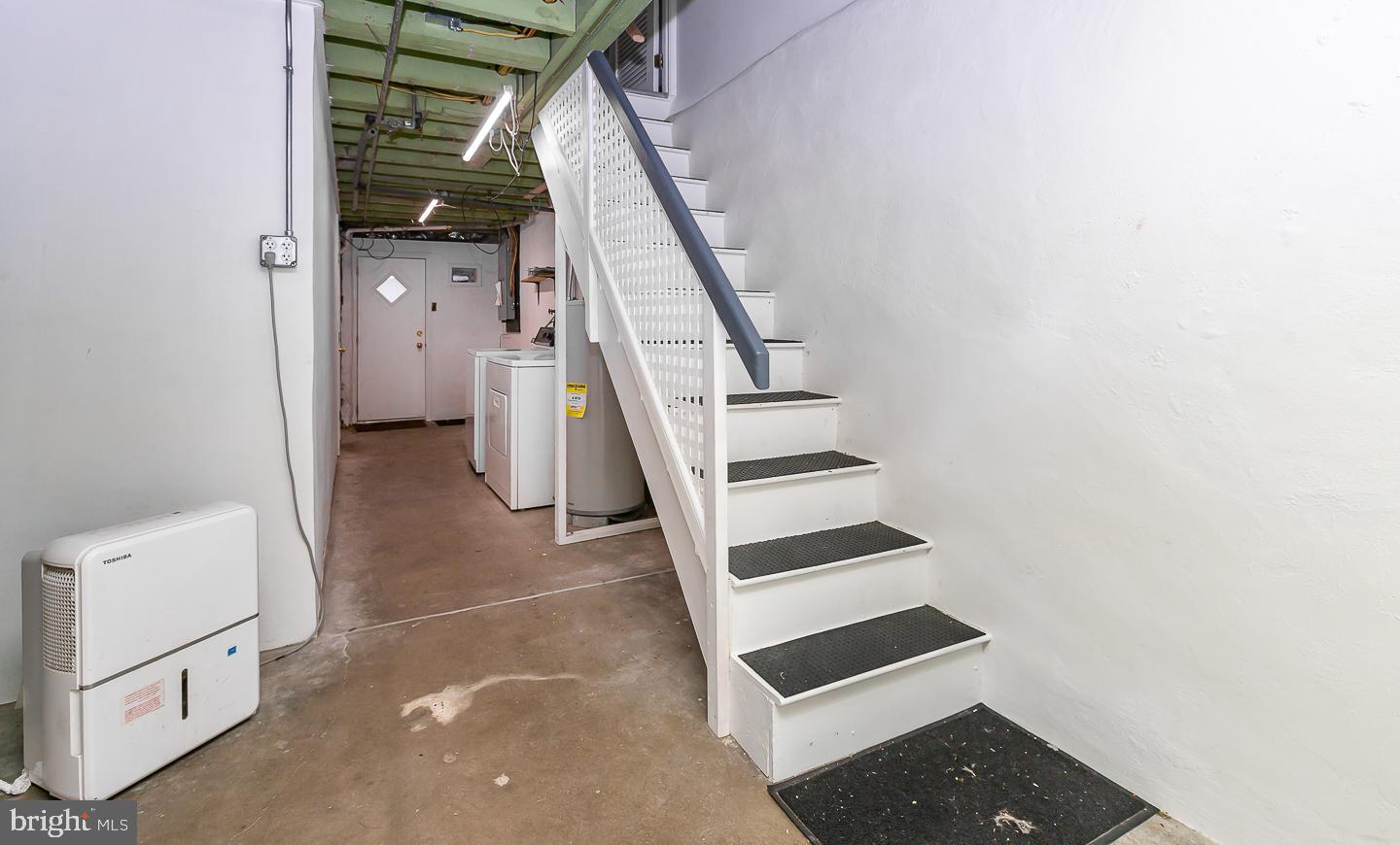 6609 Morris Park Road Philadelphia, PA 19151 - Photo 16 of 35 a view of entryway and hall with wooden floor