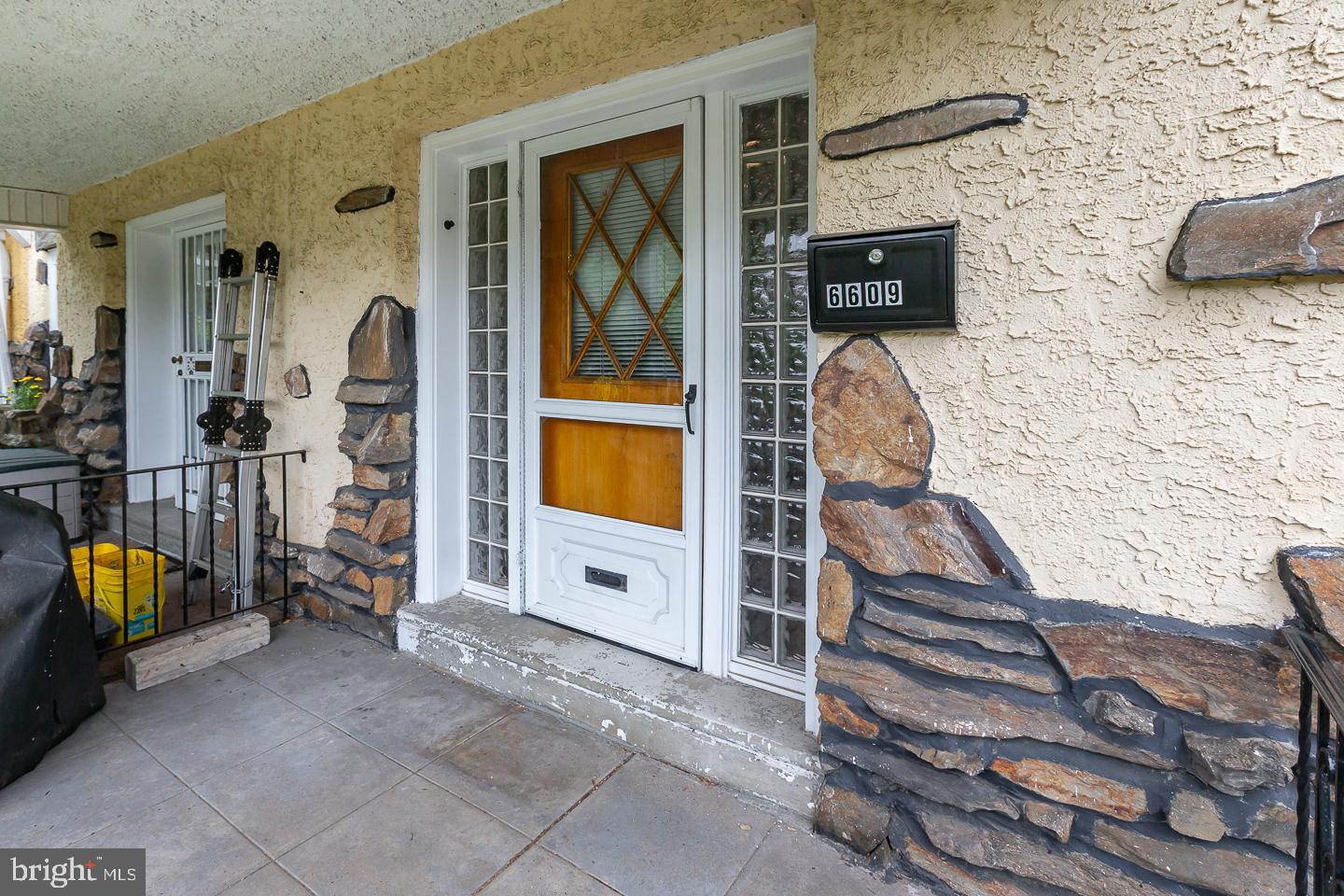 6609 Morris Park Road Philadelphia, PA 19151 - Photo 2 of 35 a view of a livingroom with furniture and staircase