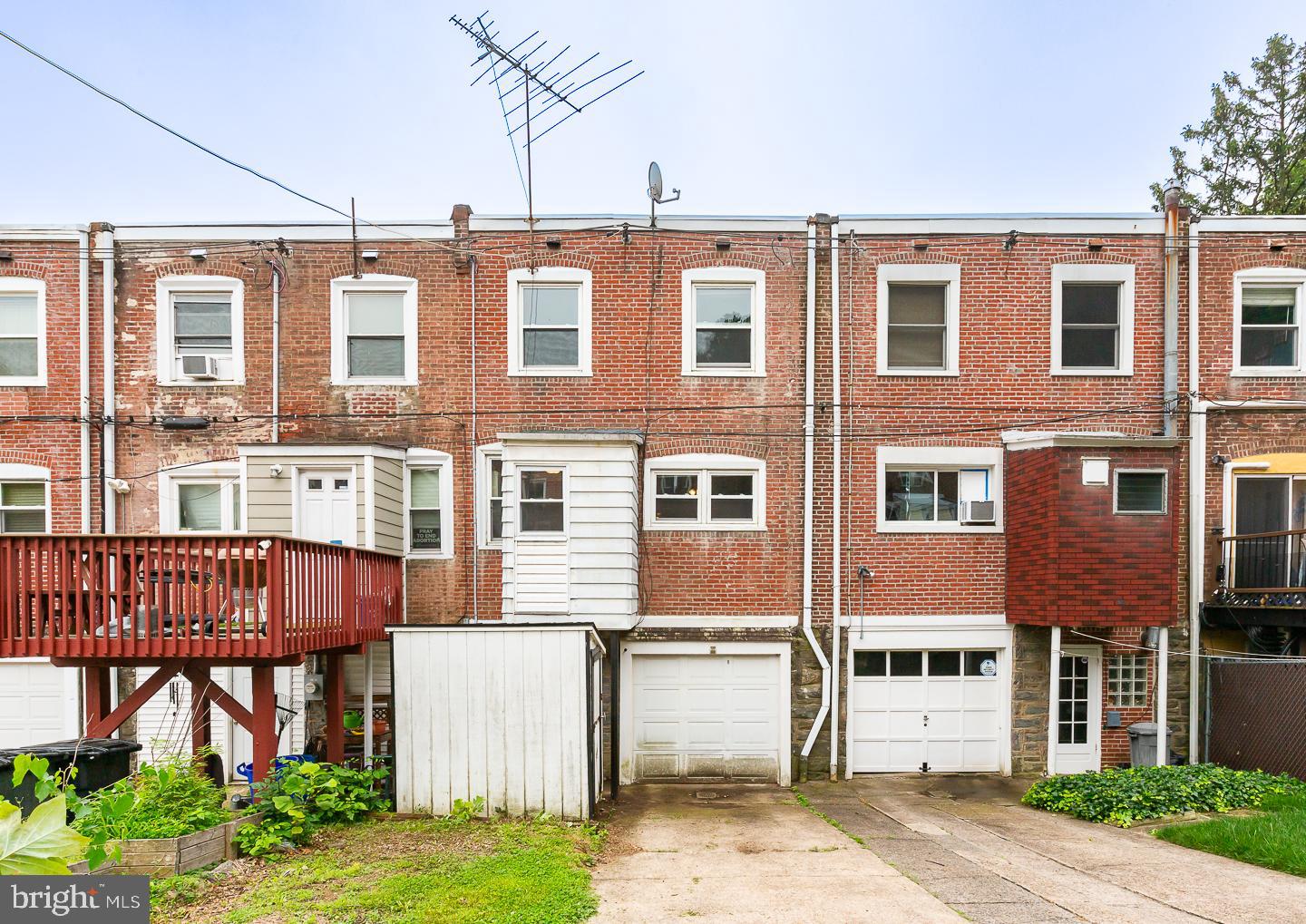 6609 Morris Park Road Philadelphia, PA 19151 - Photo 34 of 35 a front view of a building with garden